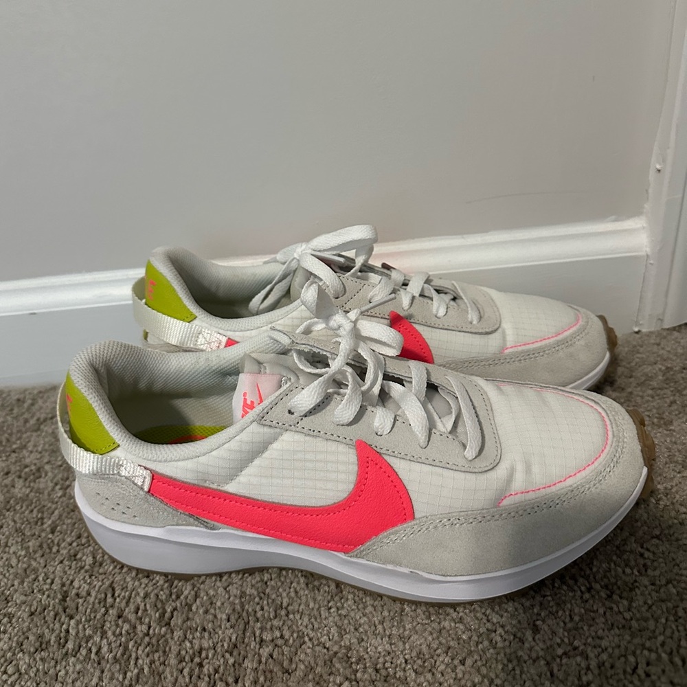 Worn once for a few hours.  Nike women waffle debut tennis shoes.